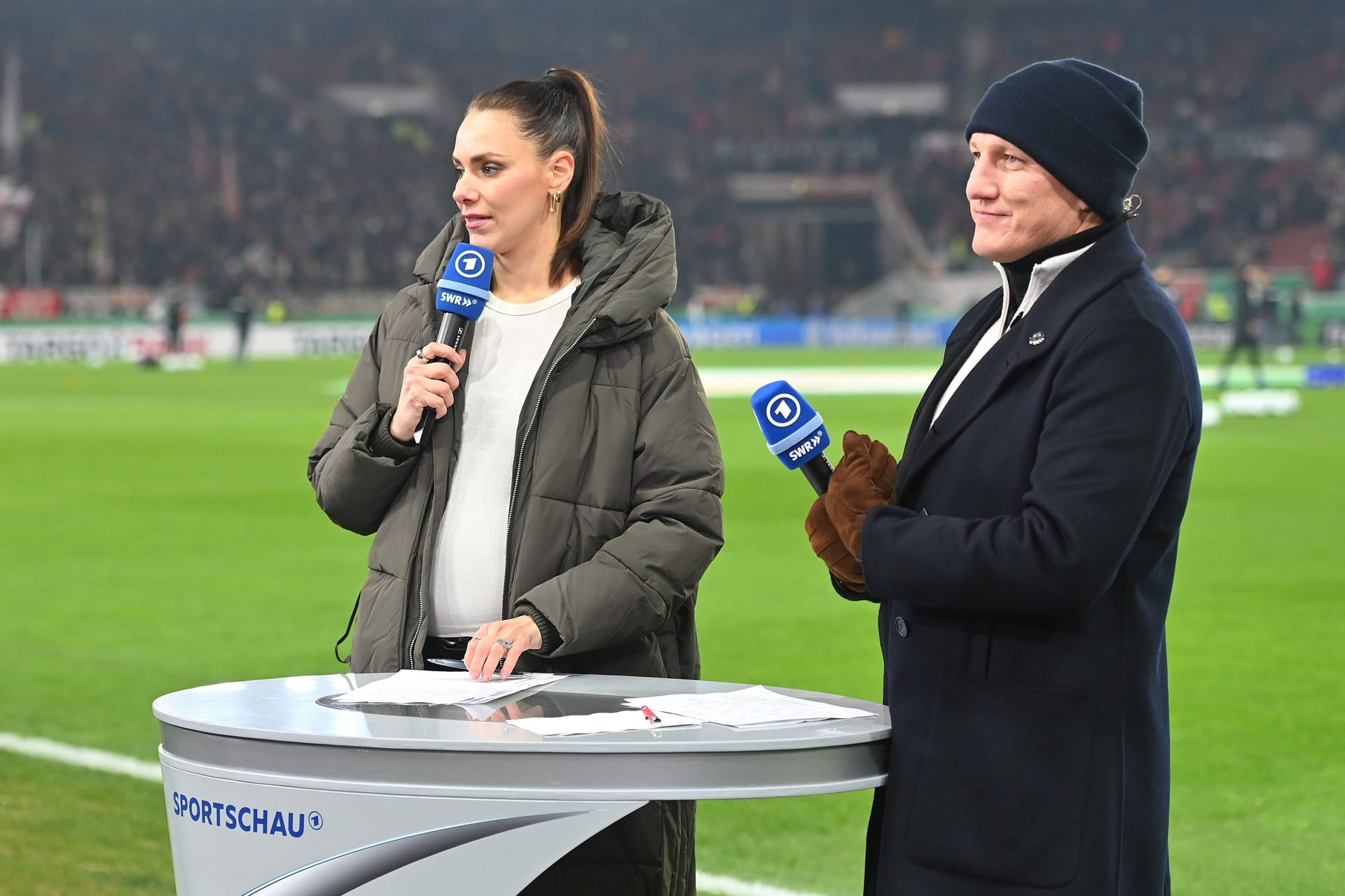 Esther Sedlaczek und Bastian Schweinsteiger beim DFB-Pokal-Viertelfinale