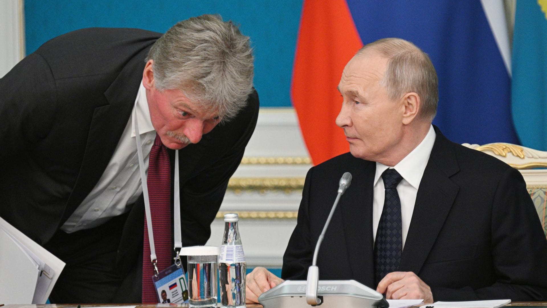 Kremlchef Putin und sein Sprecher Peskow Kremlchef Putin und sein Sprecher Peskow
