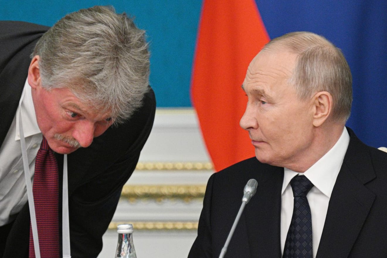 Kremlchef Putin und sein Sprecher Peskow
