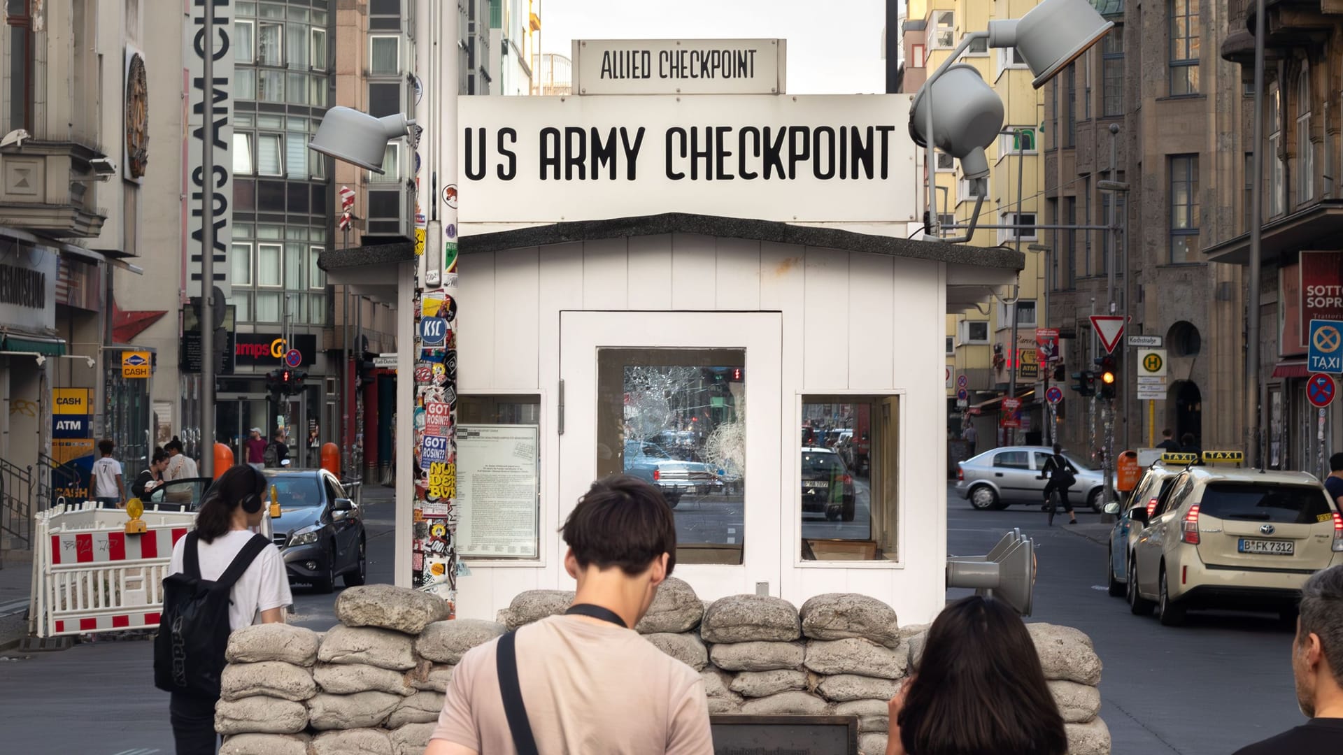 Tourists at Checkpoint Charlie in Berlin