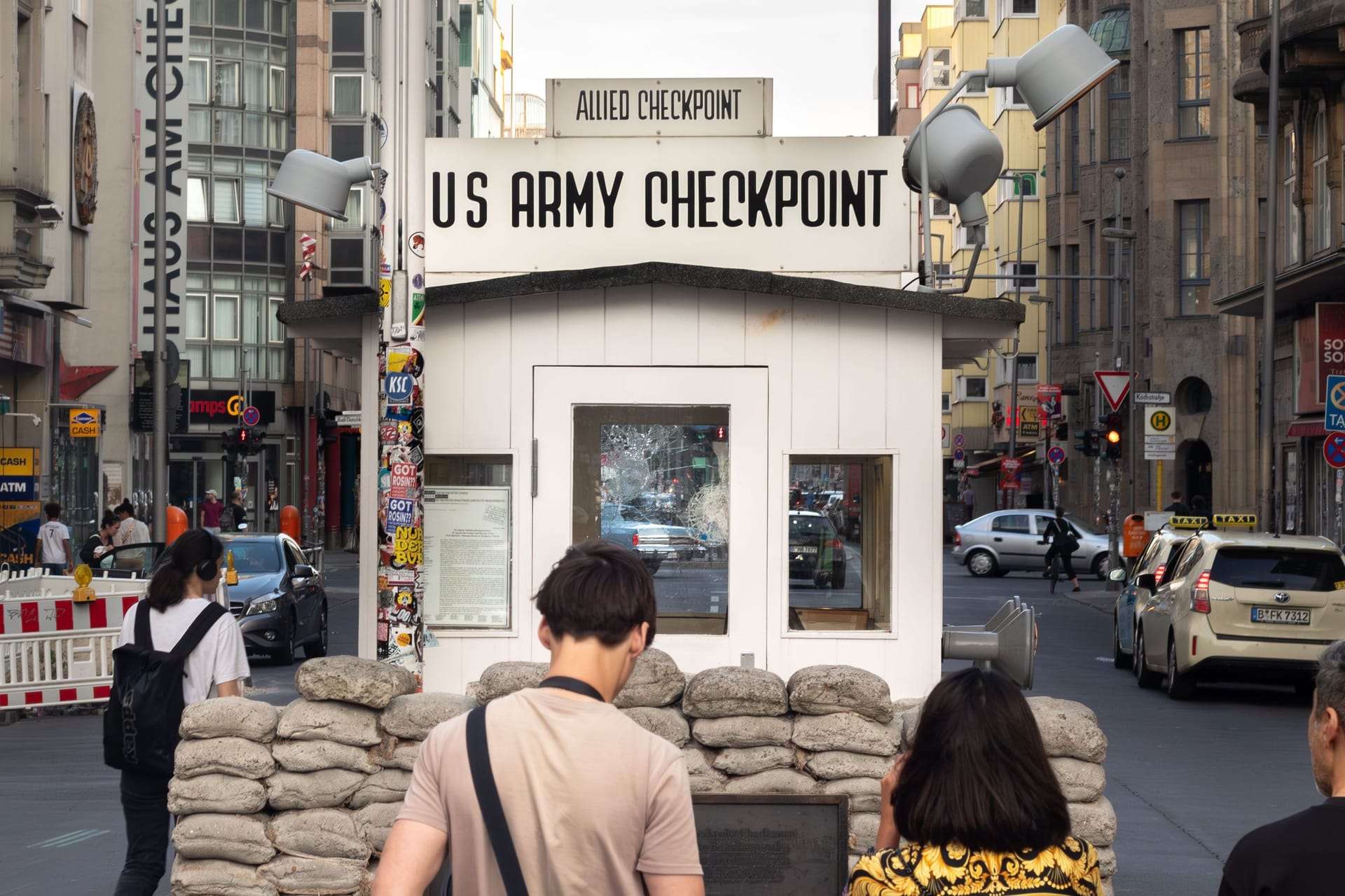 Tourists at Checkpoint Charlie in Berlin