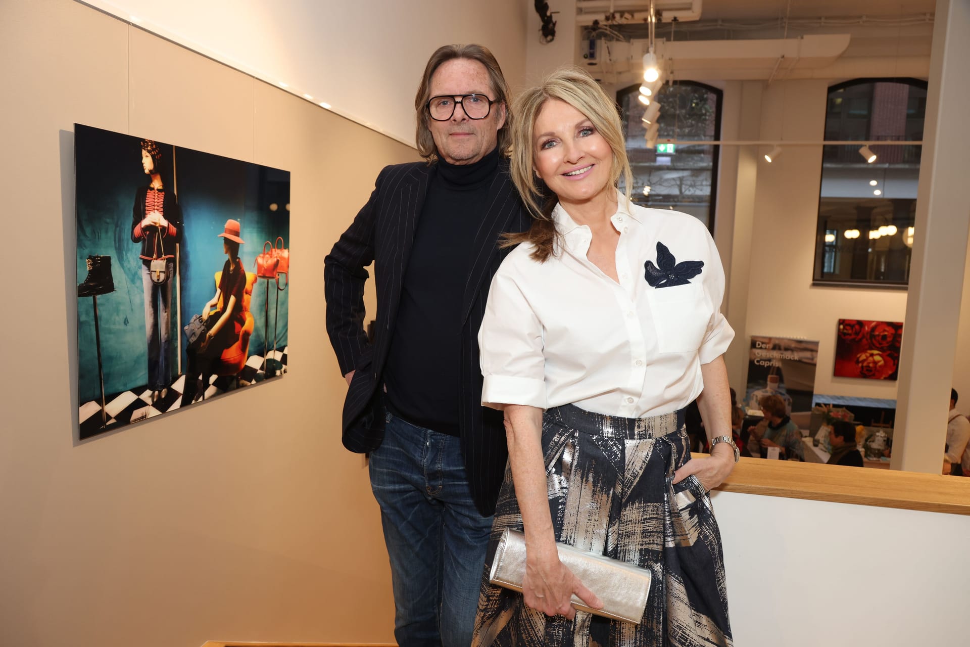 Kai Röffen und Frauke Ludowig: Seine Ehefrau unterstützte den Fotografen bei der Vernissage in Hamburg.