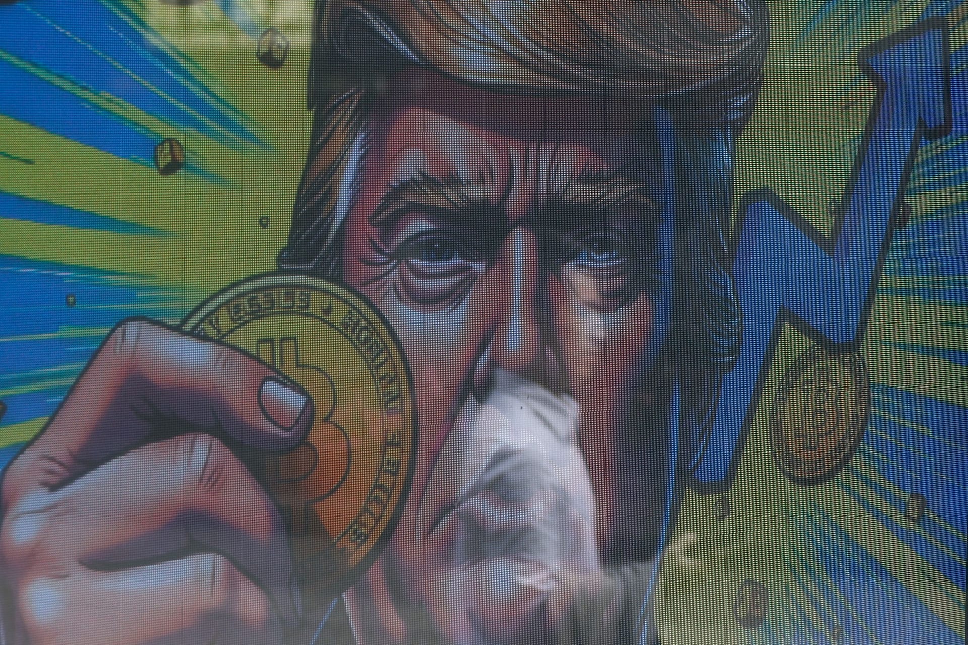 Donald Trump als Star der Krypto-Szene: Eine Werbetafel vor einer Krypto-Börse in Hongkong. (Archivbild)