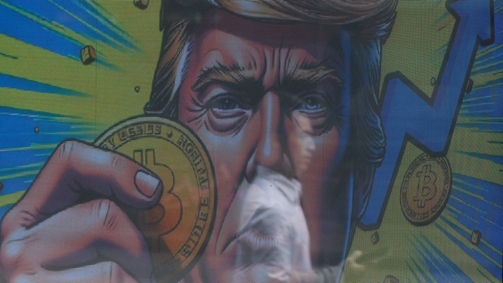 Donald Trump als Star der Krypto-Szene: Eine Werbetafel vor einer Krypto-Börse in Hongkong. (Archivbild)