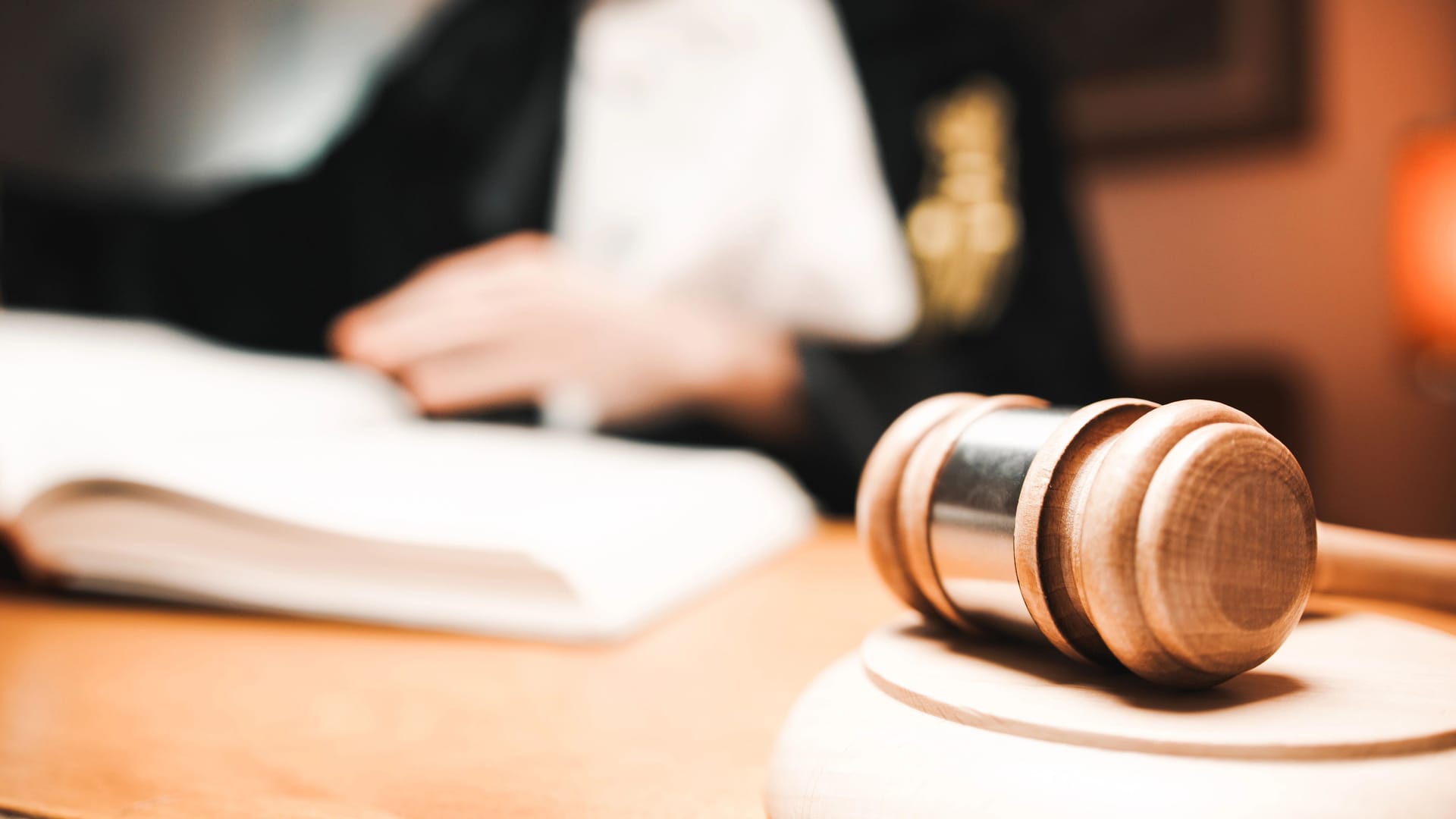 Judge In A Courtroom with hammer Judge In A Courtroom with hammer
