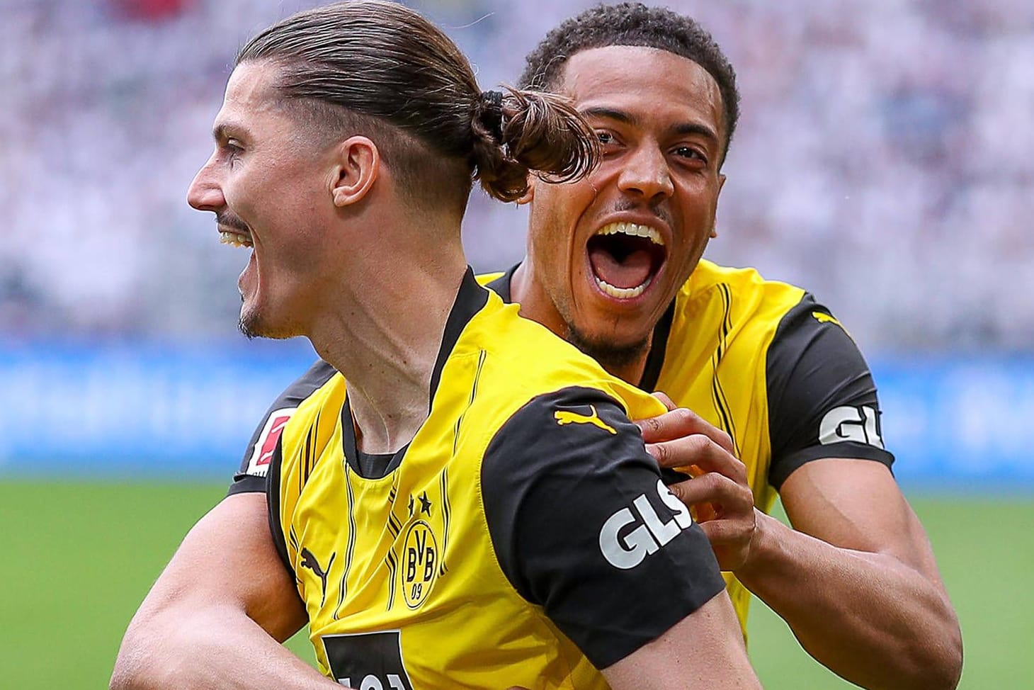 Marcel Sabitzer (vorne) und Felix Nmecha feiern: Der BVB spielt im kommenden Jahr in der Königsklasse.