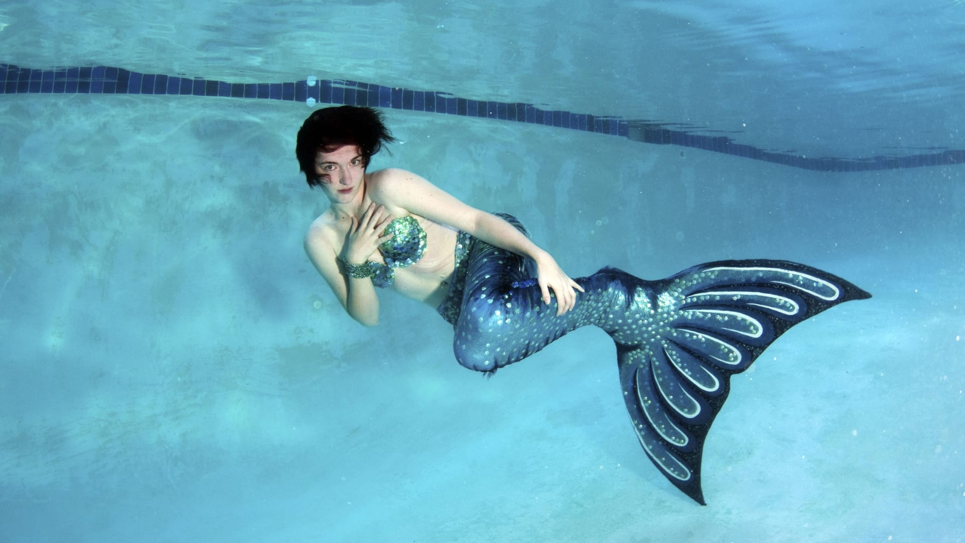 Frau mit Meerjungfrauflosse (Symbolbild): Mermaiding gilt als Sportart.