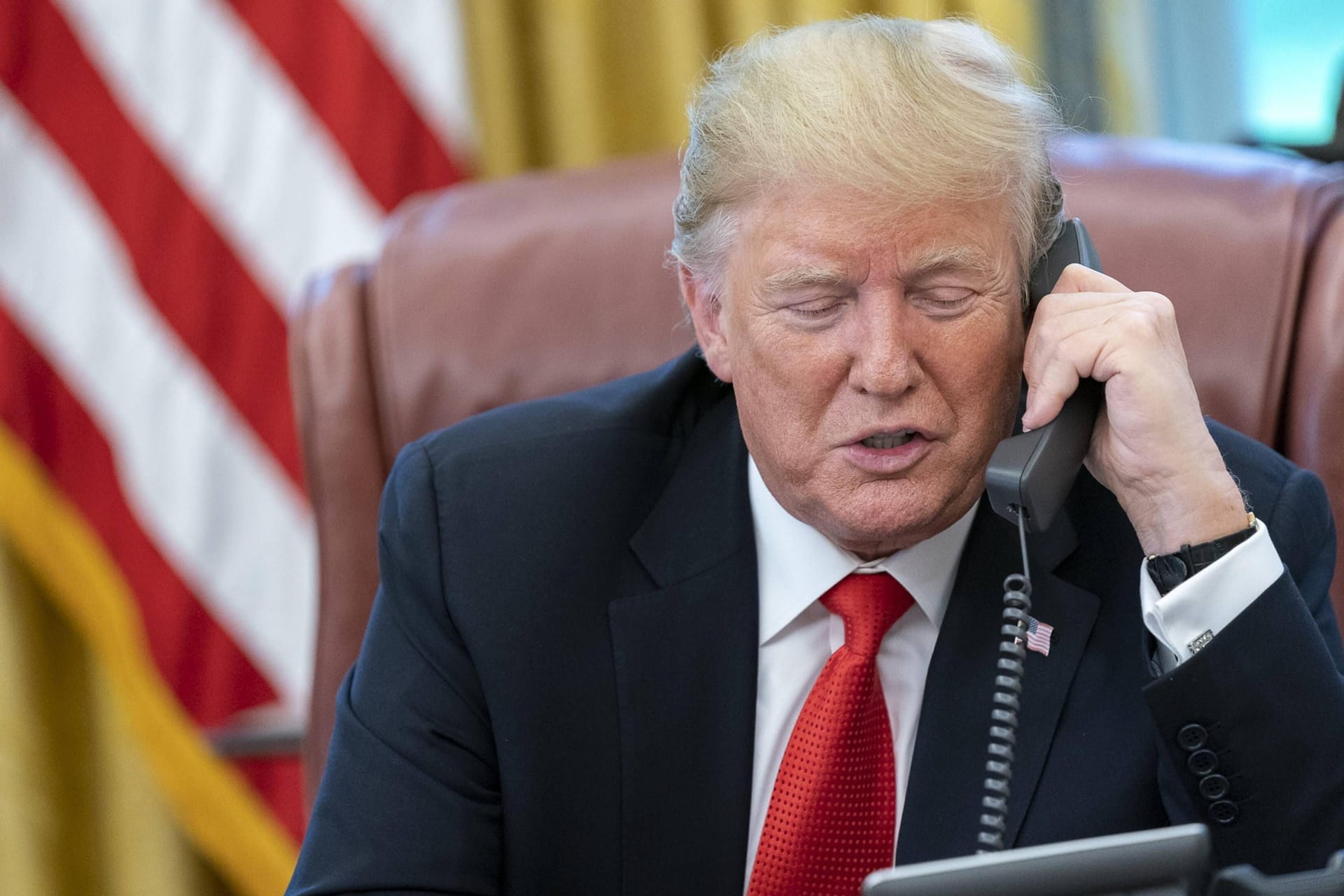 US-Präsident Donald Trump am Telefon (Archivbild): CDU-Fraktionschef Steffen Bilger kritisierte die Ergebnisse des Gesprächs.