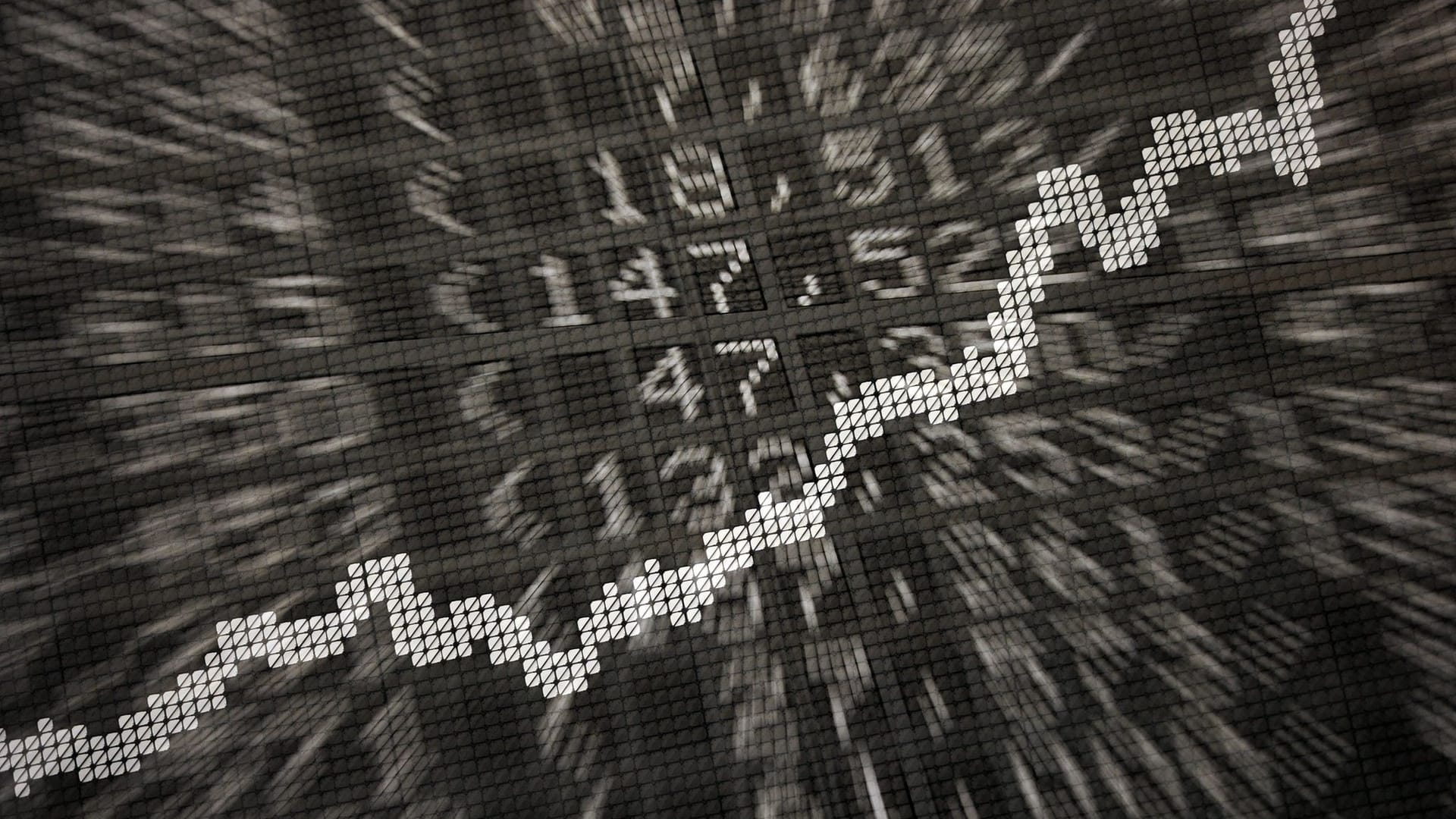 Anzeige in der Börse zeigt die Dax-Kurve Anzeige in der Börse zeigt die Dax-Kurve