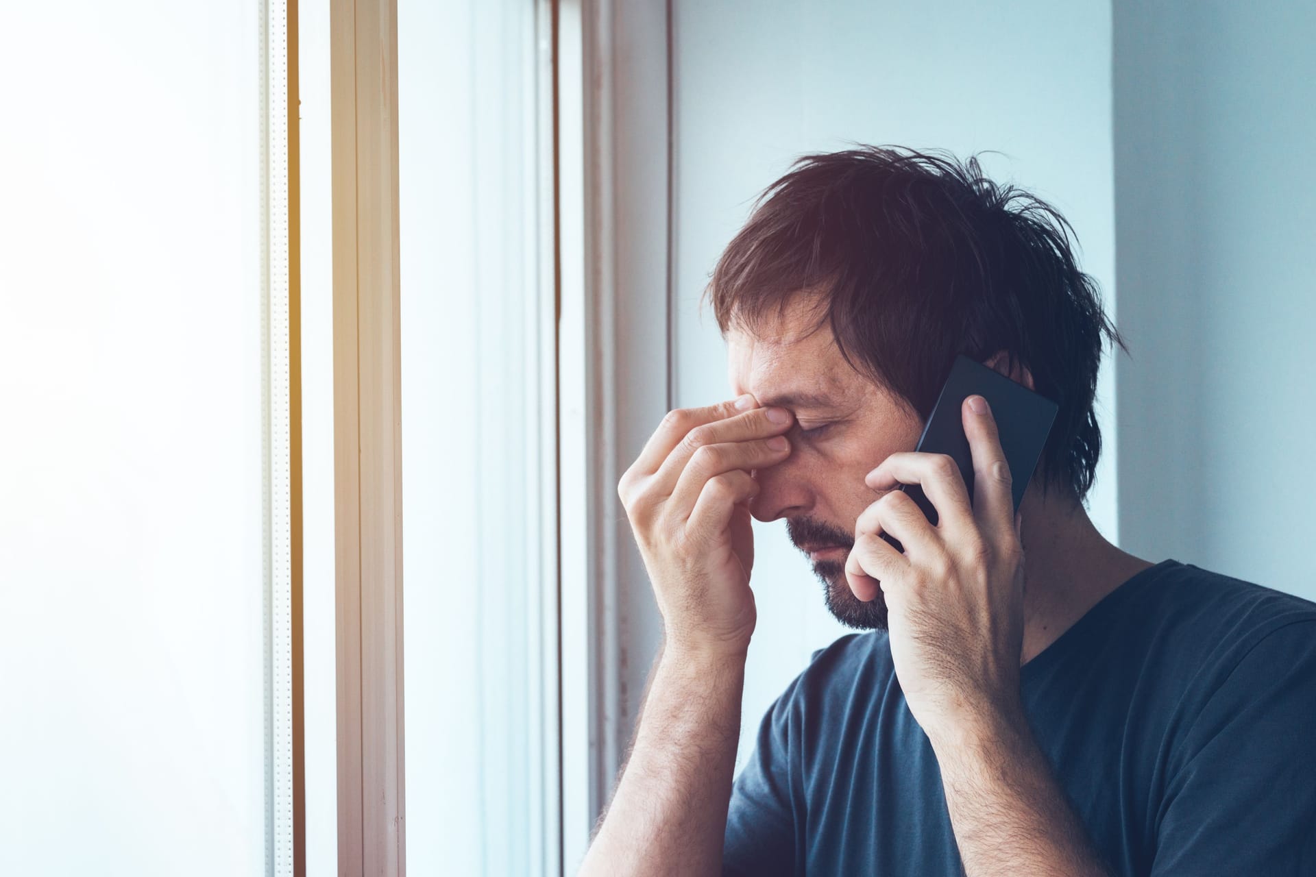 Mann am Telefon
