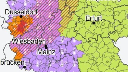 Wetter in Deutschland: Lila steht für eine Hitzewarnung, rot gestrichelt werden aufkommende Gewitter gekennzeichnet.