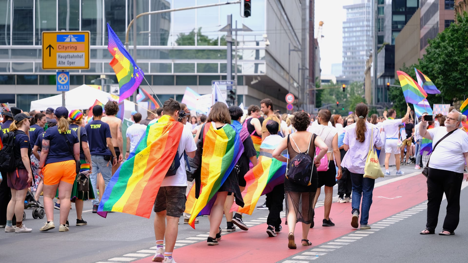 People with rainbowflags parade through downtown Frankfurt as part of CSD parade, Pride Month, fight for sexual diversity, against discrimination and attacks on queer people, FRANKFURT - July 15, 2023 People with rainbowflags parade through downtown Frankfurt as part of CSD parade, Pride Month, fight for sexual diversity, against discrimination and attacks on queer people, FRANKFURT - July 15, 2023