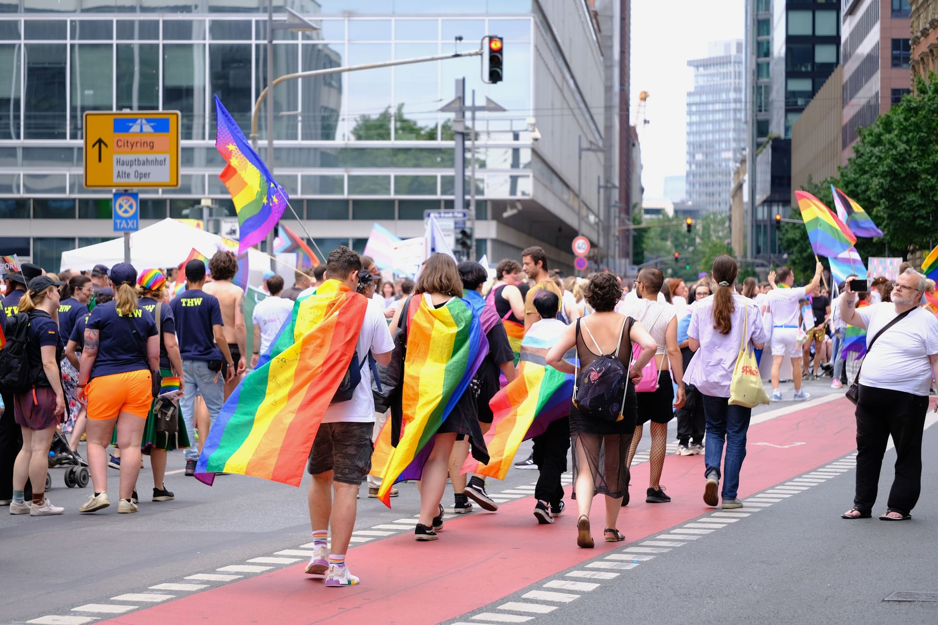 People with rainbowflags parade through downtown Frankfurt as part of CSD parade, Pride Month, fight for sexual diversity, against discrimination and attacks on queer people, FRANKFURT - July 15, 2023