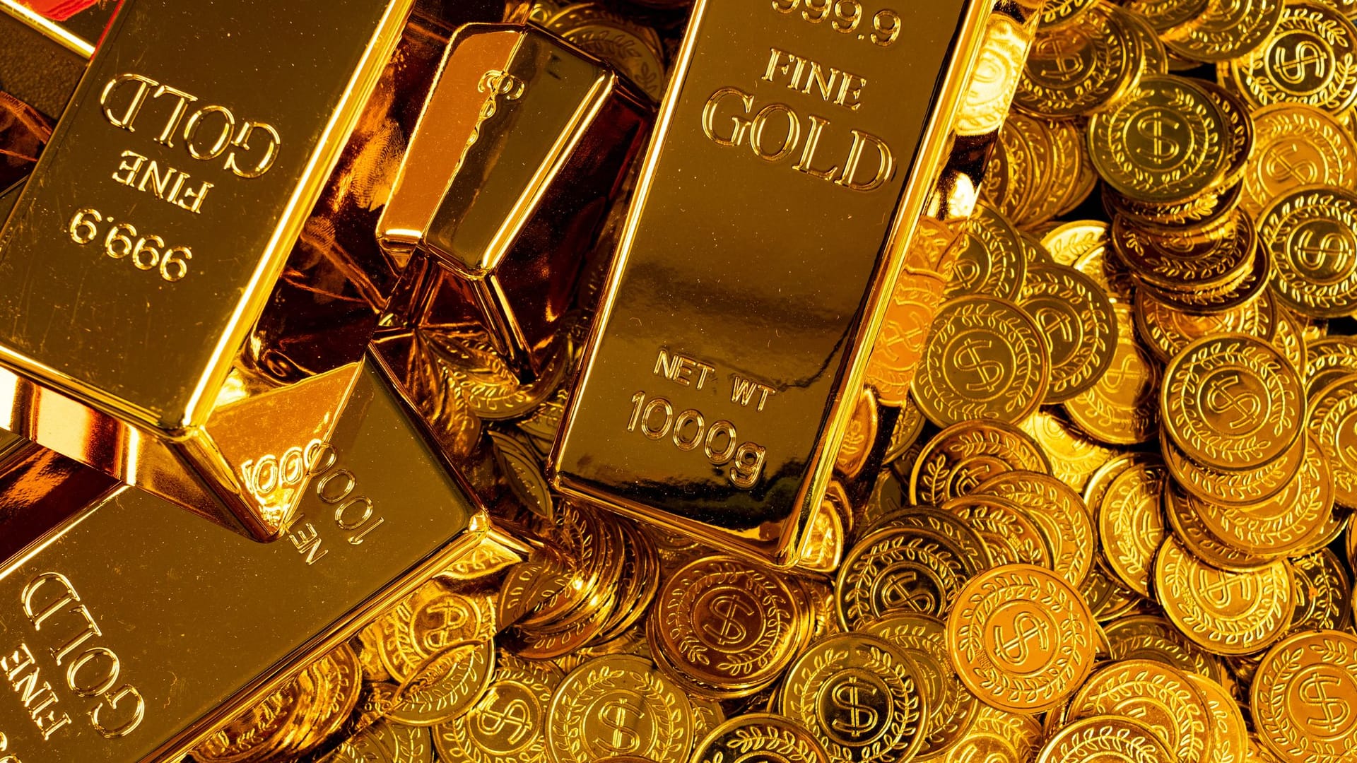 Goldbarren und Münzen Goldbarren und Münzen