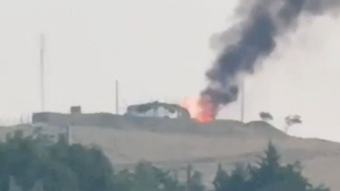 Smoke and flames rise, following Israeli strikes on Iran, in Piranshahr