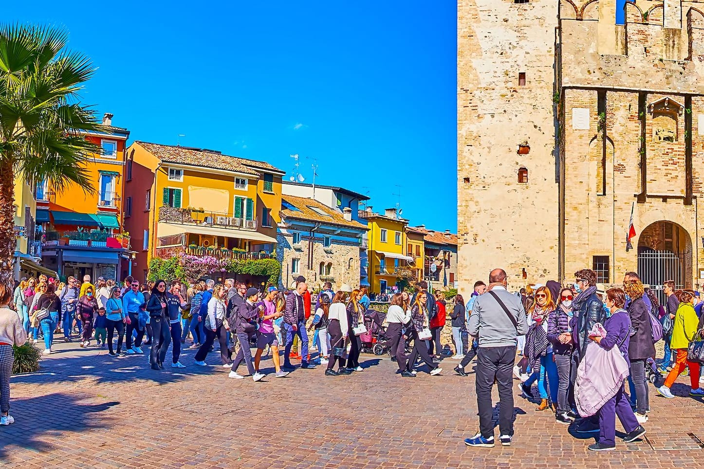 Panorama of Piazza Castello square with Scaligero Castle, Sirmione, Italy