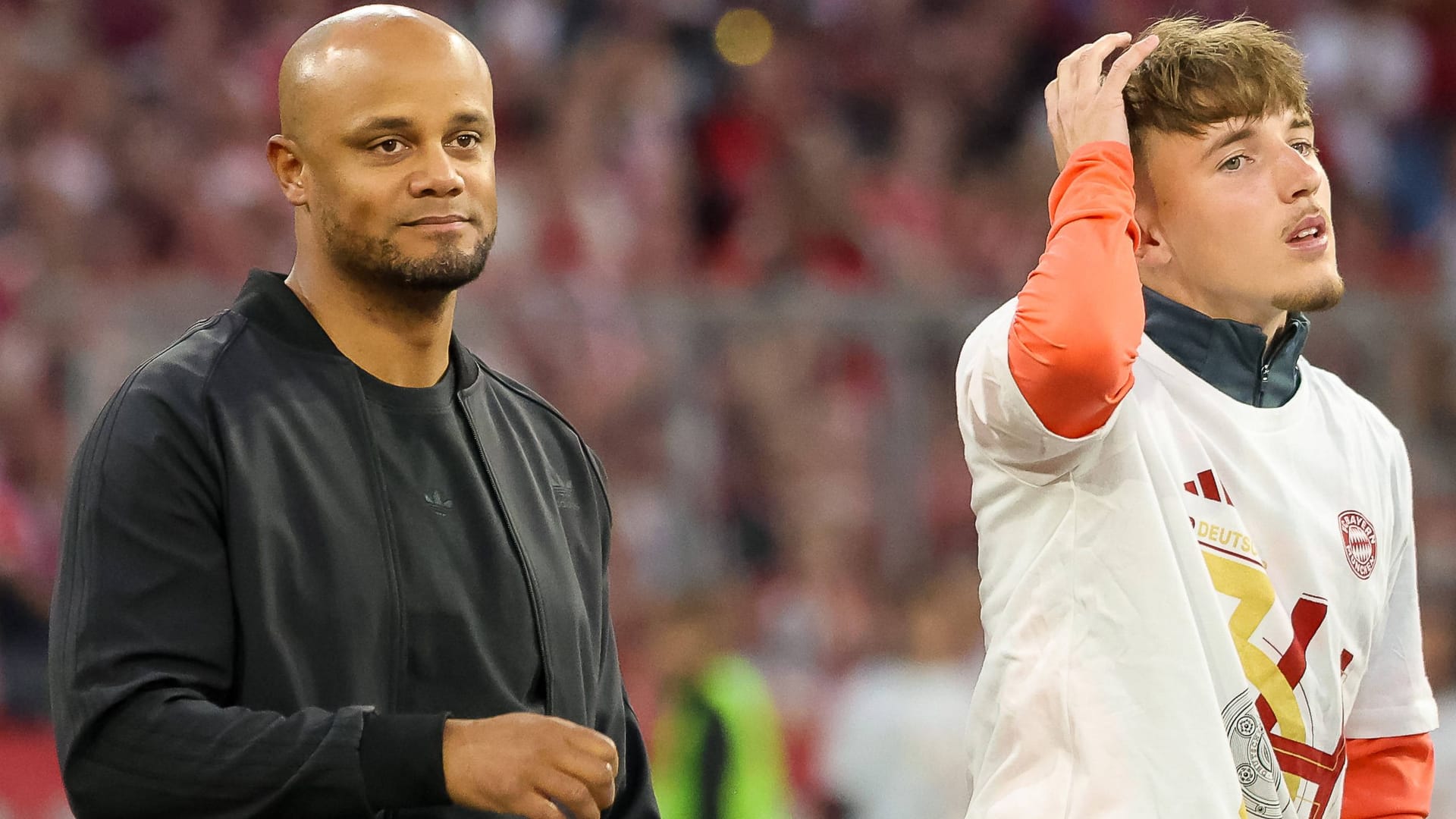 Vincent Kompany (l.) und Lennart Karl: Der Cheftrainer des FC Bayern plant das Supertalent wohl als Backup für die rechte Seite ein. Vincent Kompany (l.) und Lennart Karl: Der Cheftrainer des FC Bayern plant das Supertalent wohl als Backup für die rechte Seite ein.