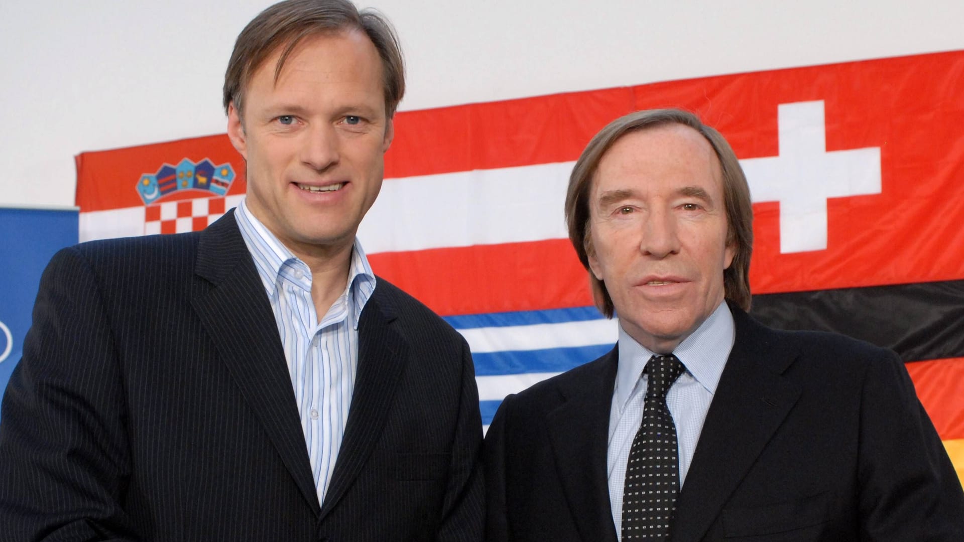 Gerhard Delling (l.) und Günter Netzer: Sie prägten jahrelang das deutsche Sportfernsehen.