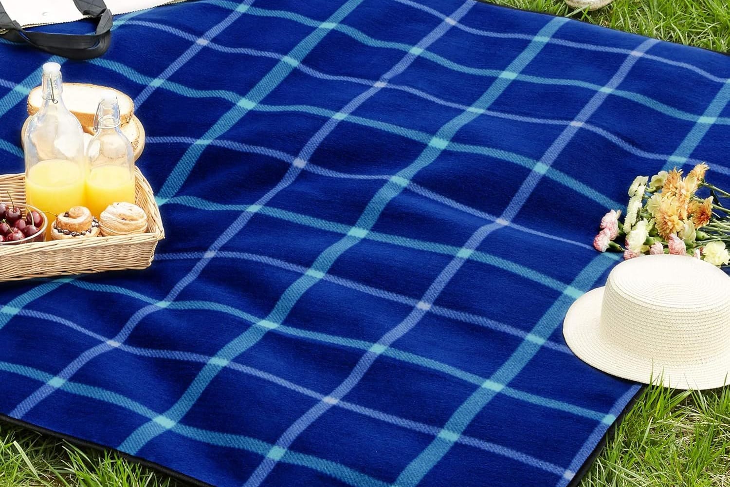 Mit der richtigen Picknickdecke wird das Outdoor-Erlebnis besonders angenehm.