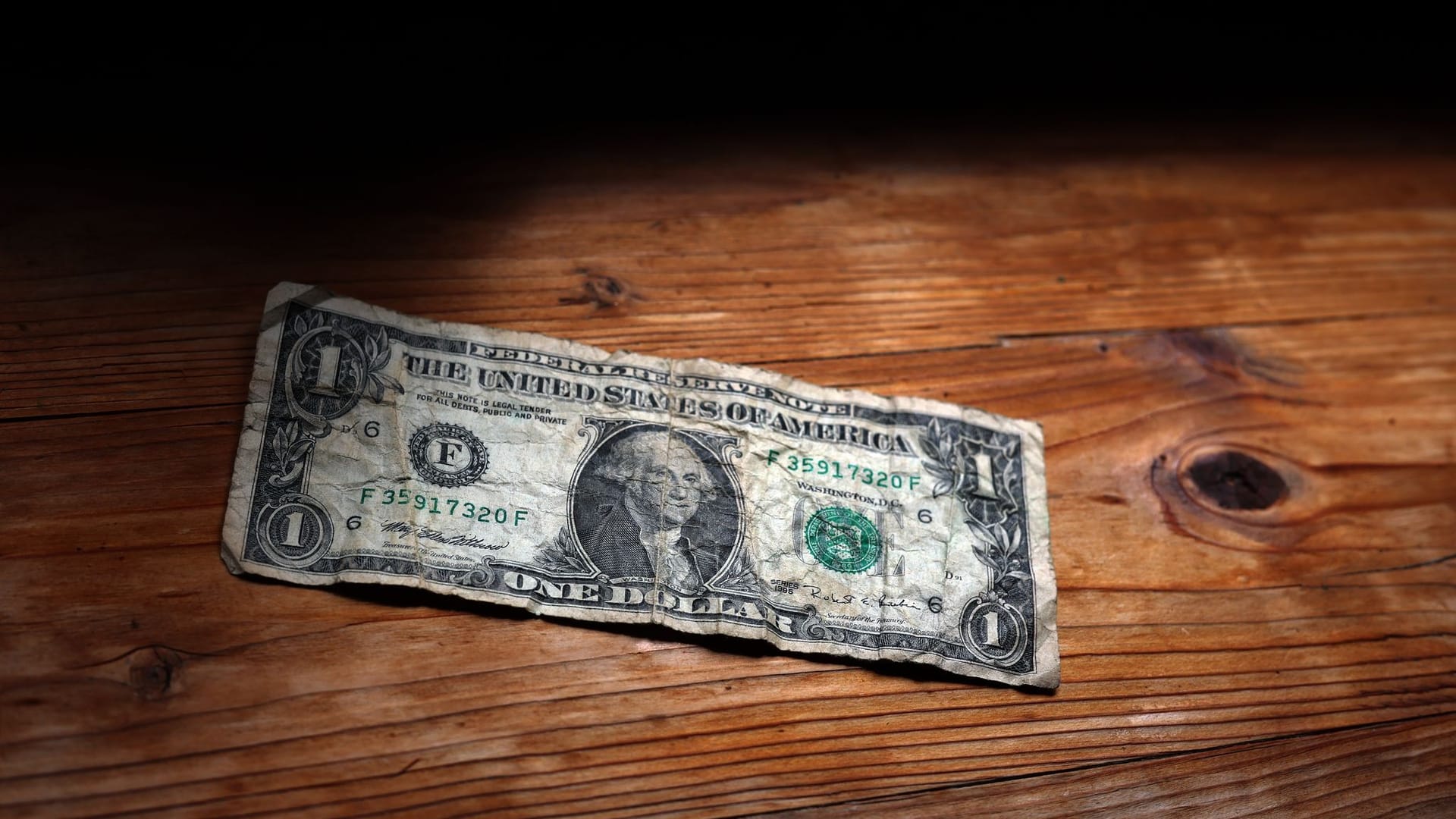 Abgenutzter Ein-Dollar-Schein Abgenutzter Ein-Dollar-Schein