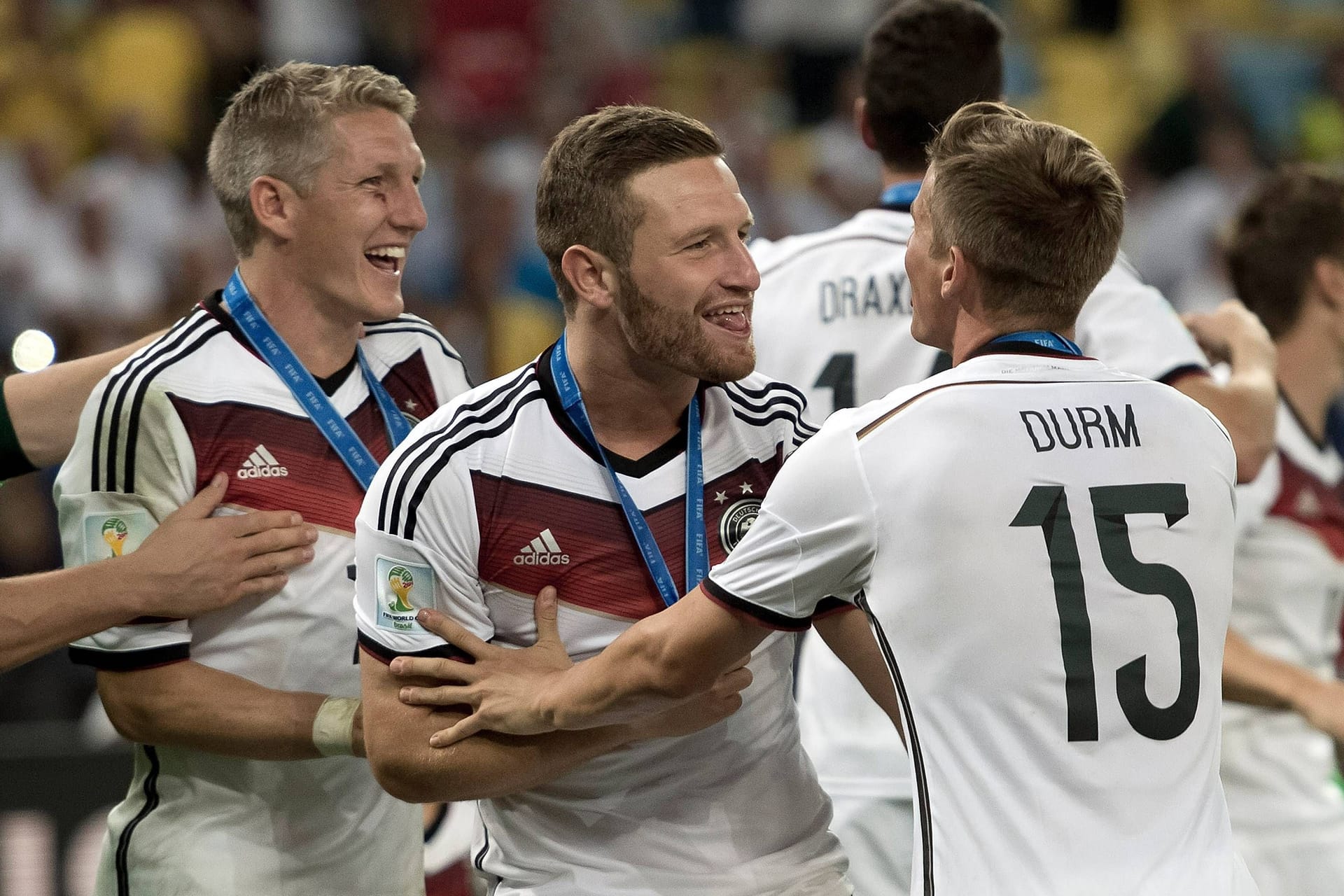 Shkodran Mustafi (Mitte) mit Bastian Schweinsteiger und Erik Durm: Zusammen gewannen sie 2014 den WM-Titel.