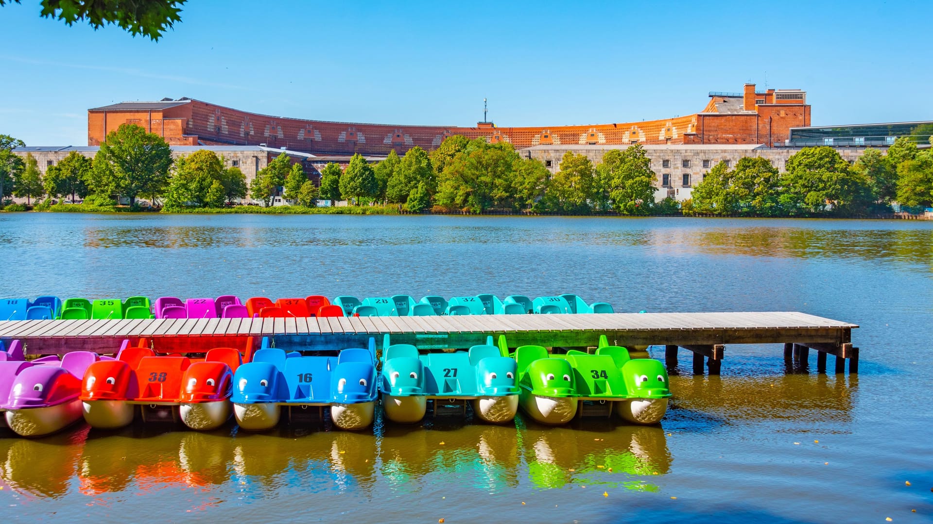 Paddle boats and former Nazi congress hall in Nürnberg, Germany