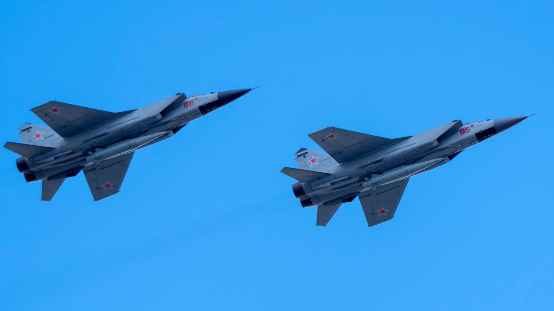 MOSCOW, RUSSIA - MAY 7, 2021: Avia parade in Moscow. group jet fighter aircraft Mikoyan MiG-31 in the sky on parade of Victory in World War II in Moscow, Russia