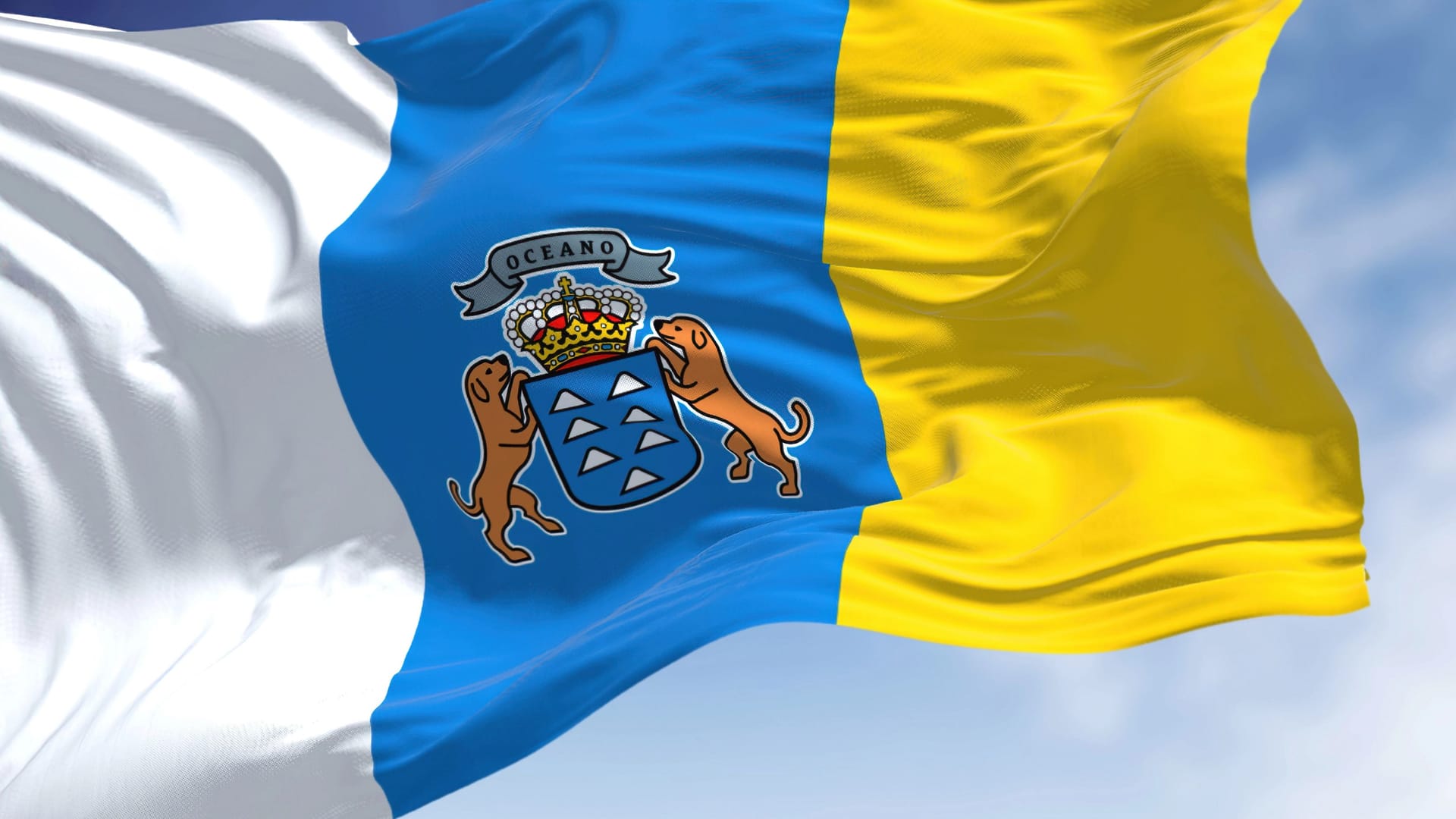 Die Flagge der Kanarischen Inseln: Das Archipel trägt in seinem Wappen Hunde. Die Flagge der Kanarischen Inseln: Das Archipel trägt in seinem Wappen Hunde.