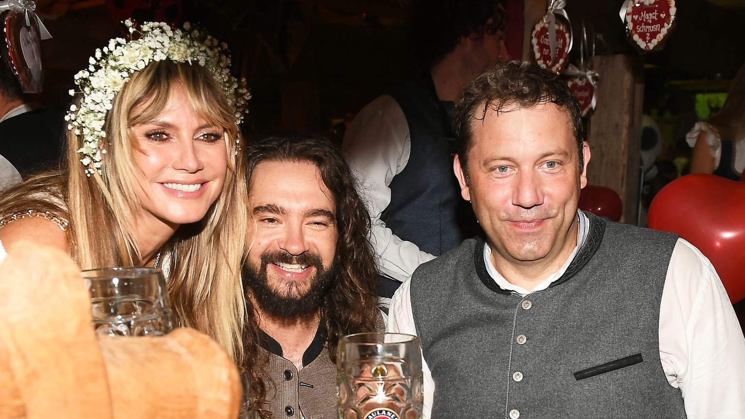 Heidi Klum (l.) mit ihrem Ehemann Tom Kaulitz und Vizekanzler Lars Klingbeil: Sie trafen im Käferzelt des Münchner Oktoberfests aufeinander.