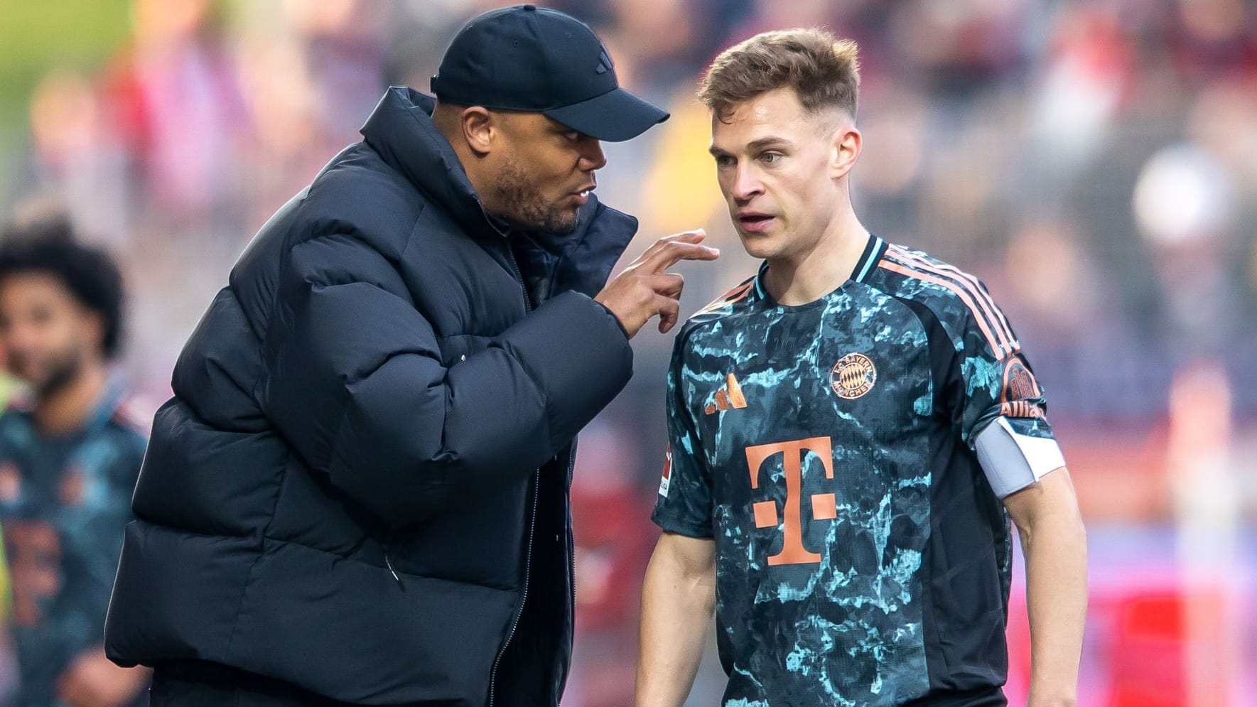 Vincent Kompany (l) und Joshua Kimmich Vincent Kompany (l) und Joshua Kimmich