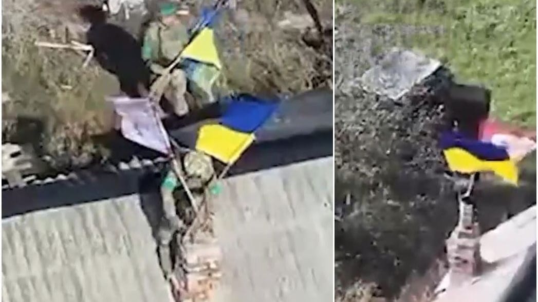 Das Foto der ukrainischen Luftwaffe soll Soldaten zeigen, die die ukrainische Flagge in einem befreiten Dorf hissen. Das Foto der ukrainischen Luftwaffe soll Soldaten zeigen, die die ukrainische Flagge in einem befreiten Dorf hissen.