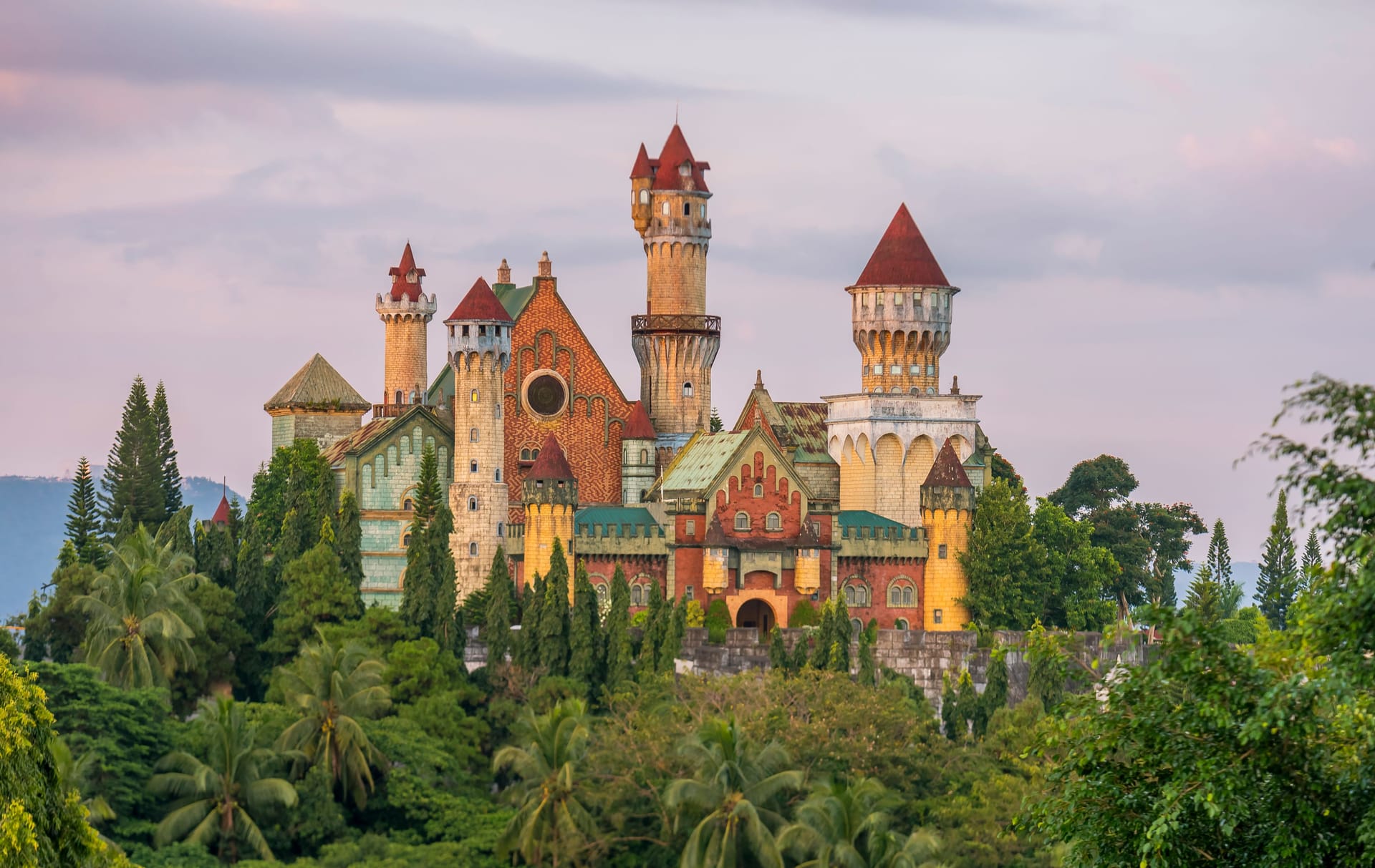 Fantasy World, an abandoned amusement park with a medieval themed castle, in Lemery, Batangas, near Tagaytay. Late afternoon shot. Fantasy World, an abandoned amusement park with a medieval themed castle, in Lemery, Batangas, near Tagaytay. Late afternoon shot.